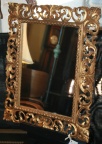 Carved and gilded wood framed mirror