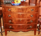 American Federal (1790) mahogany bow front chest of 4 drawers with string inlay details on graceful bracket legs.